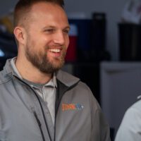 JUNKCO+ staff smiling