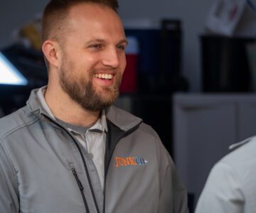 JUNKCO+ staff smiling